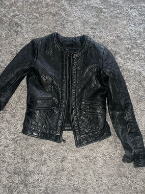Women's Black Quilted Leather Jacket with Zip Pocket Details